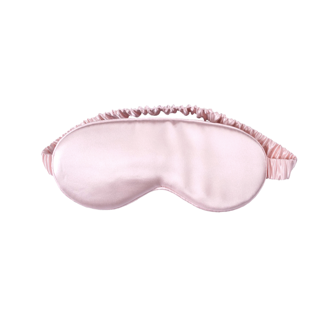 White Trousseau's 100% Mulberry Silk Eye Mask in Pink. Offering the best affordable sleep products in Singapore, our sleep eye mask helps you sleep better and faster. Recommended by dermatologists, silk helps retain moisture in your skin naturally, preventing eye wrinkles. It is silky soft and cooling on the skin, perfect for sleeping! 
