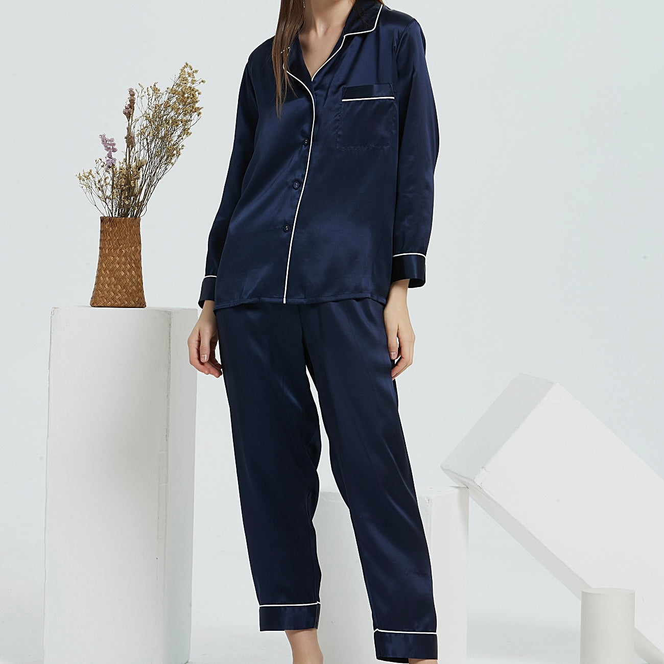 White Trousseau’s Pure Mulberry Silk Long Pyjamas Set in Navy. High quality and breathable, our silk pyjamas set will make you feel stylish while lounging at home. It is the best sleepwear for Singapore weather!