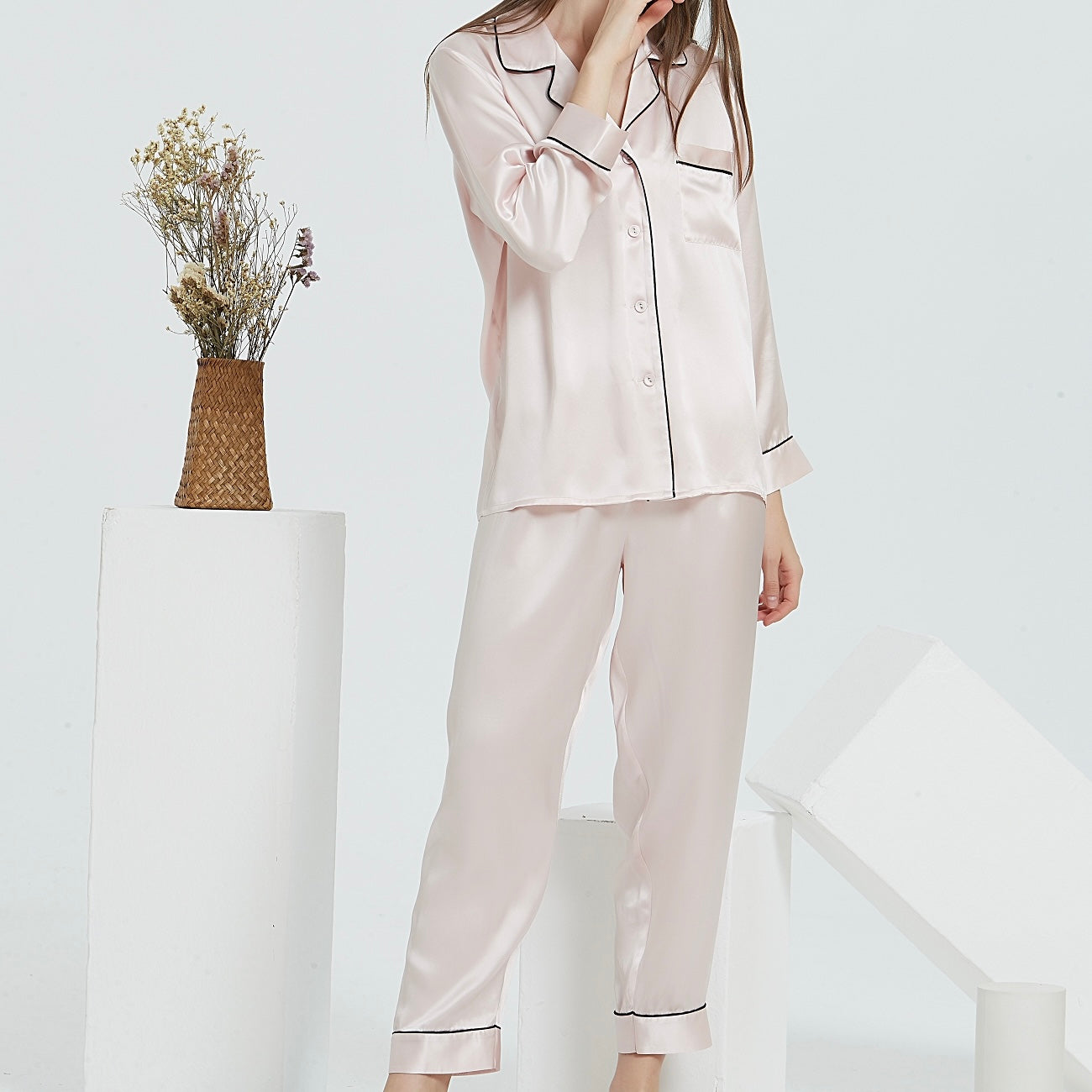 White Trousseau’s Pure Mulberry Silk Long Pyjamas Set in Pink. High quality and breathable, our silk pyjamas set will make you feel stylish while lounging at home. It is the best sleepwear for Singapore weather!