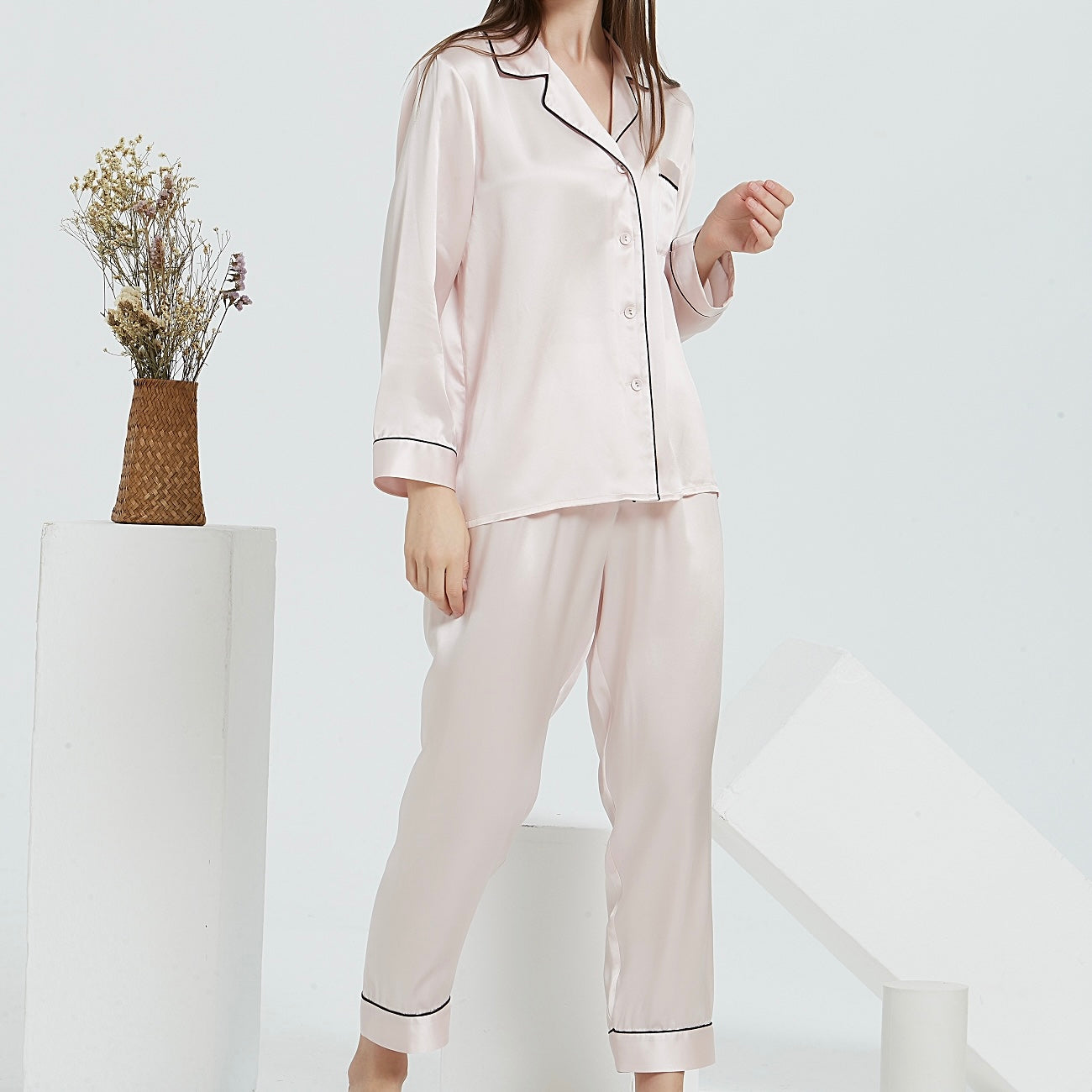 White Trousseau’s Pure Mulberry Silk Long Pyjamas Set in Pink. High quality and breathable, our silk pyjamas set will make you feel stylish while lounging at home. It is the best sleepwear for Singapore weather!