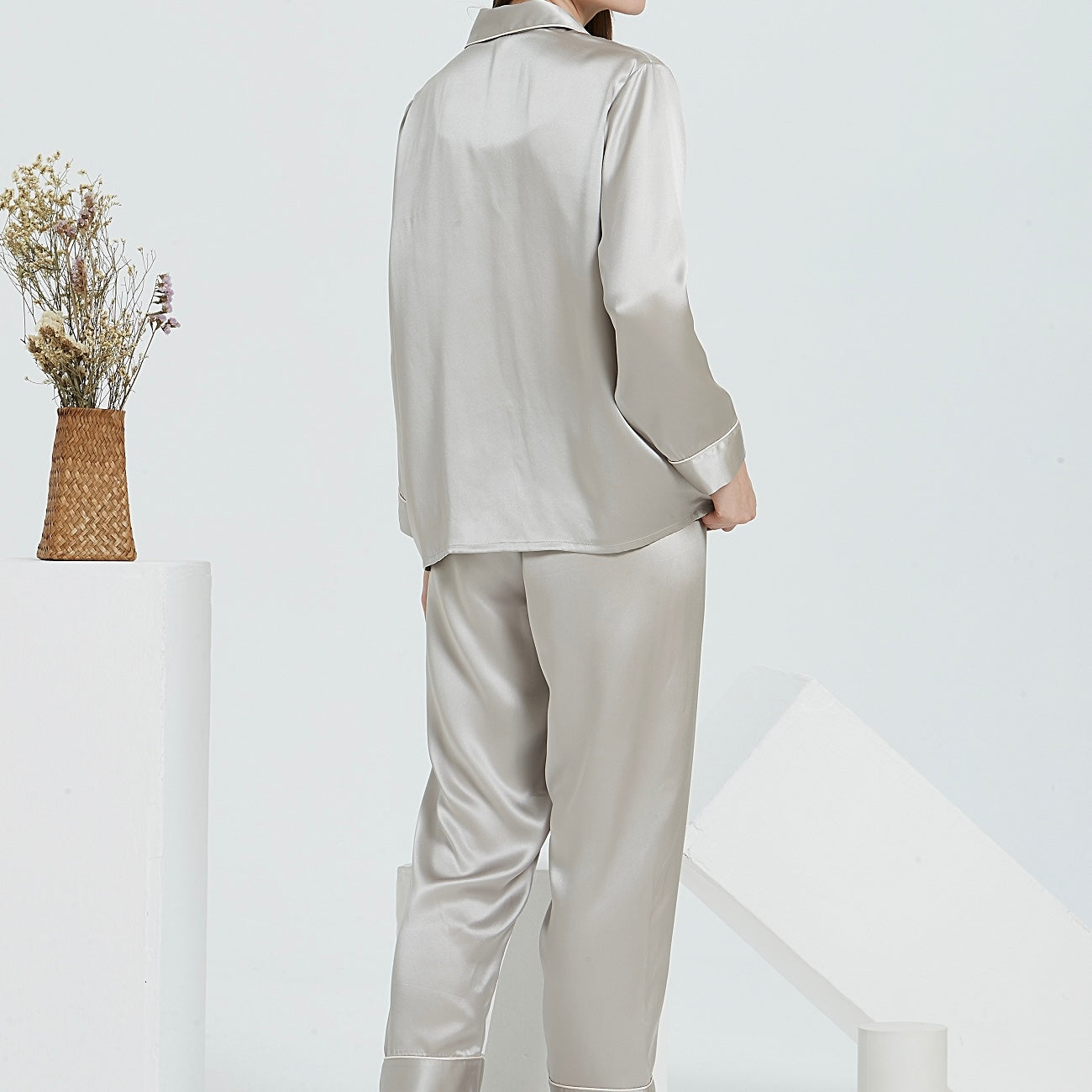 White Trousseau’s Pure Mulberry Silk Long Pyjamas Set in Silver. High quality and breathable, our silk pyjamas set will make you feel stylish while lounging at home. It is the best sleepwear for Singapore weather!