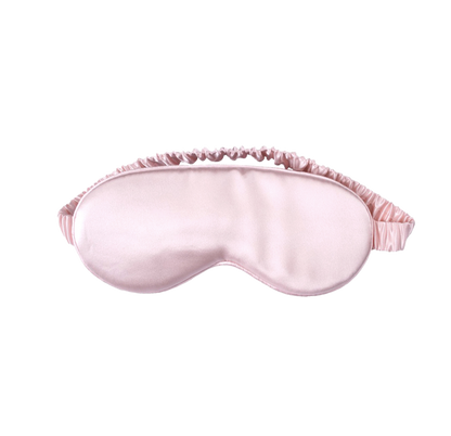 White Trousseau's 100% Mulberry Silk Eye Mask in Pink. Offering the best affordable sleep products in Singapore, our sleep eye mask helps you sleep better and faster. Recommended by dermatologists, silk helps retain moisture in your skin naturally, preventing eye wrinkles. It is silky soft and cooling on the skin, perfect for sleeping! 