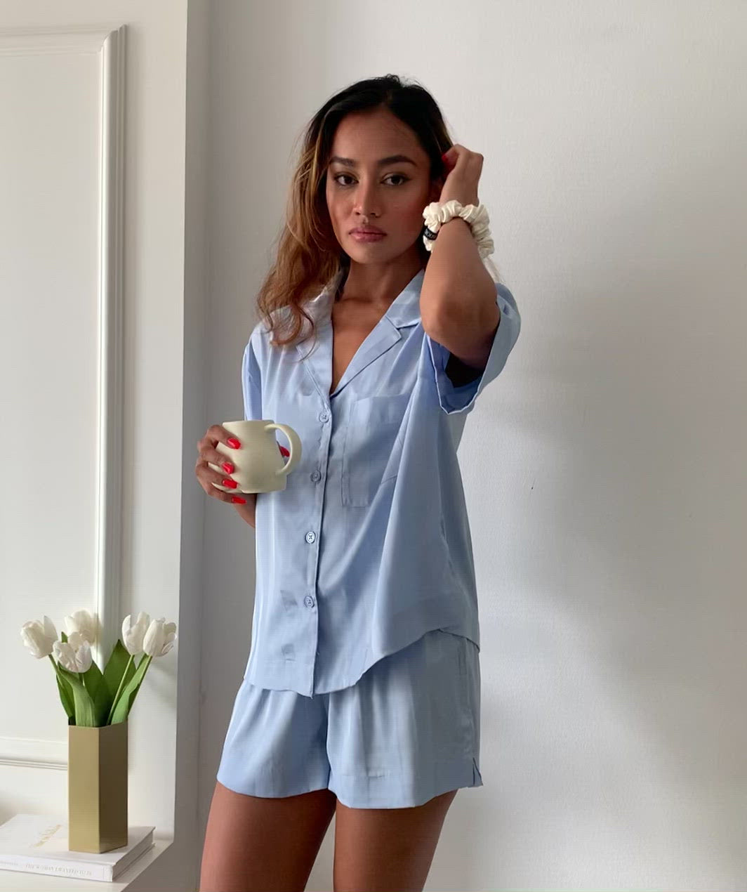 Front and back video of our Sadie Pyjamas Set. Lounge in our perfect silk short matching pyjamas set. Consist of a short sleeved top and a pair of shorts.