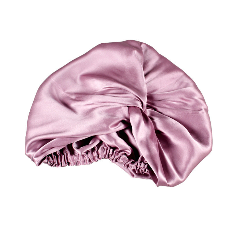 100% Pure Mulberry Silk Hair Turban in lilac.  Mulberry silk is less absorbent than any other fabric, leaving hair more hydrated, glowing, and healthier