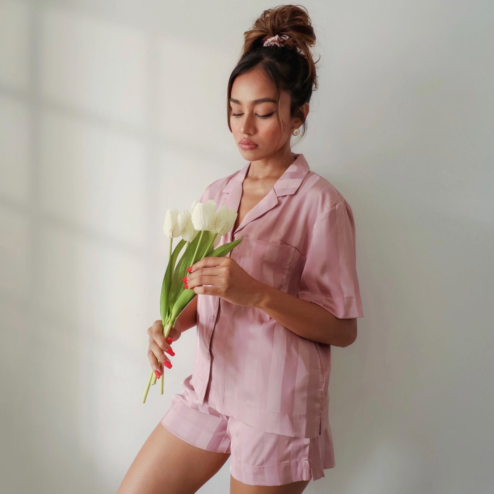 Sadie Silk Pyjamas Set in Rose. Made from 100% pure mulberry silk. Shop now a pair of this pyjama set while looking cute and stylish on a casual day. An essential sleepwear for everyday comfort in your own home.