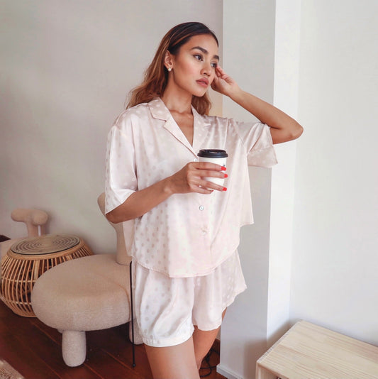Julia Silk Pyjama Set in Blush with Polkadot details. Crafted with 100% soft and smooth viscose. Shop now a pair of this pyjama set while looking cute and stylish on a casual day. An essential sleepwear for everyday comfort in your own home.
