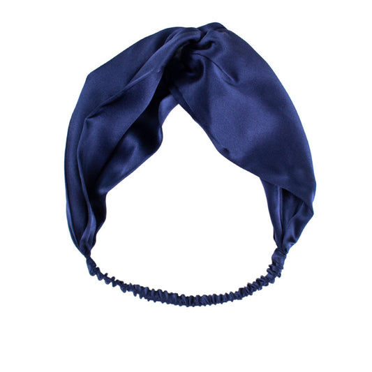 White Trousseau's 100% Mulberry Silk Headband in Navy Blue. Made of OEKO-TEX® certified, organic mulberry silk, our silk headbands prevent hair from creasing and kinking, resulting in sleek and smooth strands.