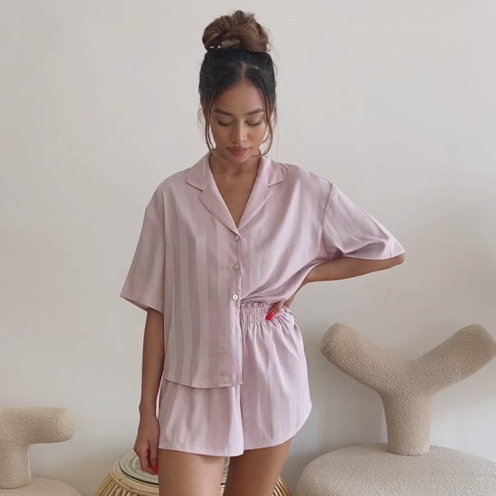 Sadie Pyjamas Short Set in Lilac Video. Front View and Back View Details. Made from 100% soft and smooth viscose silk. Shop a pair of this silk pyjama short set only at White Trousseau Singapore.