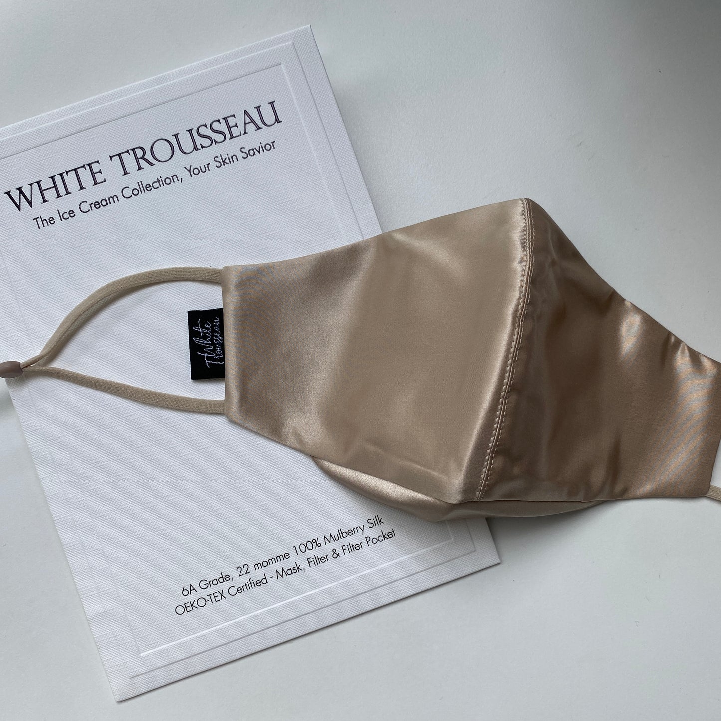 White trousseau silk mask beautiful packed. Designed to protect your face while looking elegant. Our silk mask is gentle on skin and prevents from irritation. Invest now in White Trousseau's mulberry silk mask.
