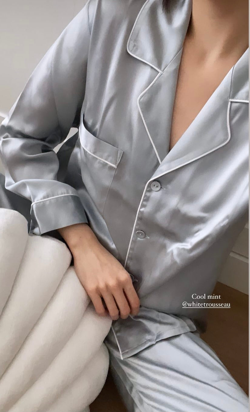 Pure Silk Long Pyjamas Set in Silver with White PipingWhite Trousseau’s Pure Mulberry Silk Long Pyjamas Set in Mint. High quality and breathable, our silk pyjamas set will make you feel stylish while lounging at home. It is the best sleepwear for Singapore weather!