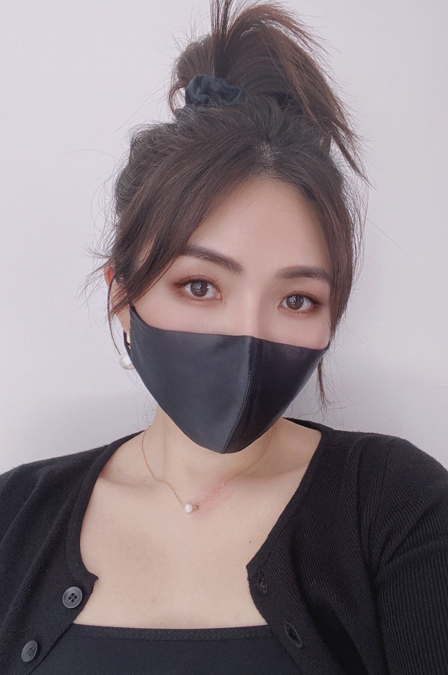 Model wearing Pure Mulberry Silk Face Mask in Black