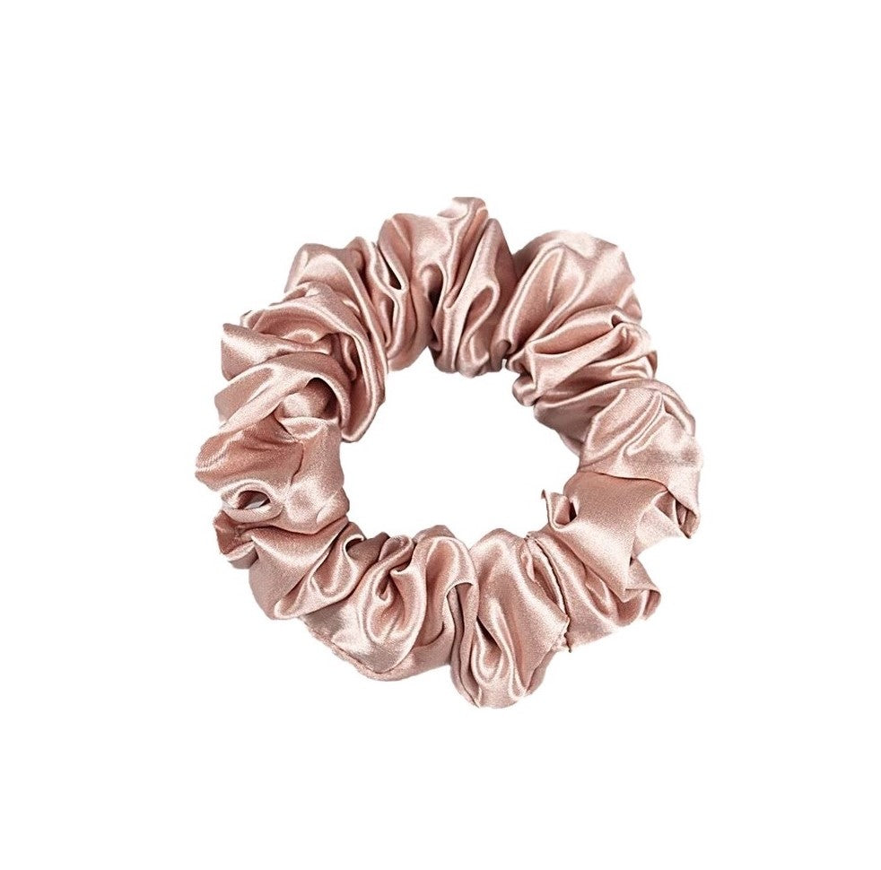 Silk scrunchies are not only stylish, but they're also kind to your hair. The smooth surface minimizes friction, preventing knotting and other damage.